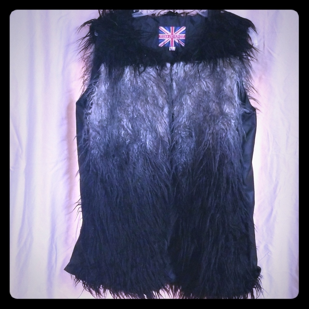 Very cute faux fir and faux leather vest
